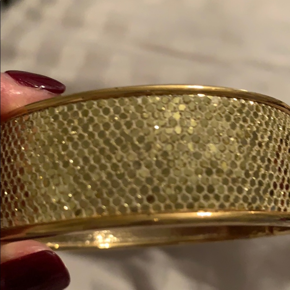 Gold tone wide bracelet